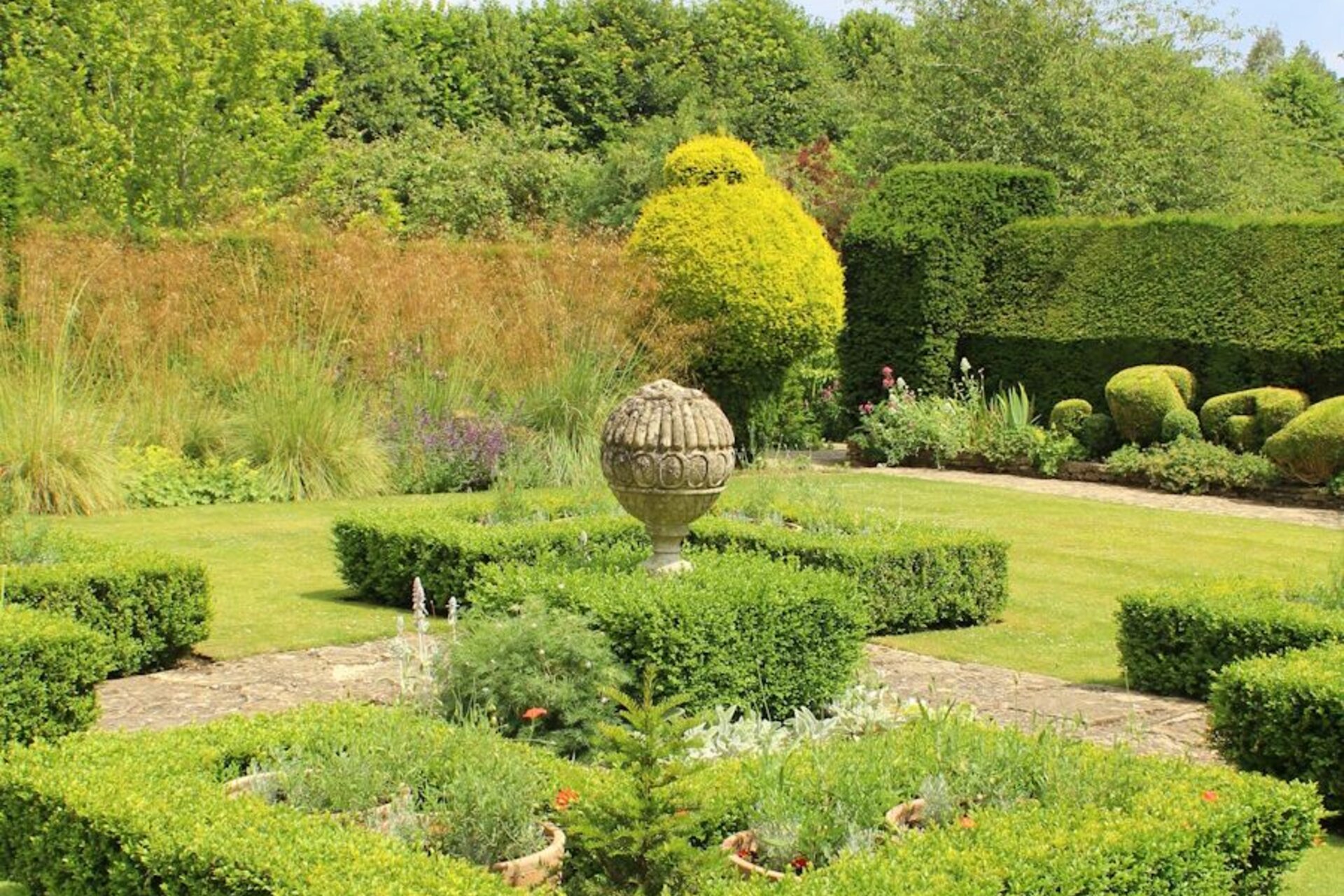 Professional UK garden landscaping with neat hedges