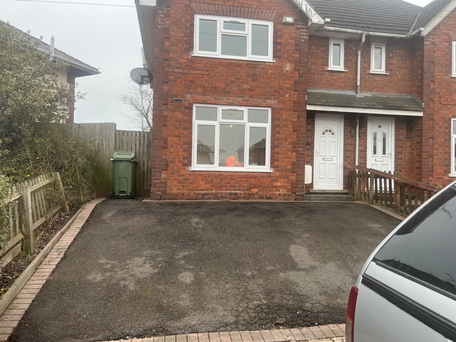Front driveway and fencing at residential property in Birmingham