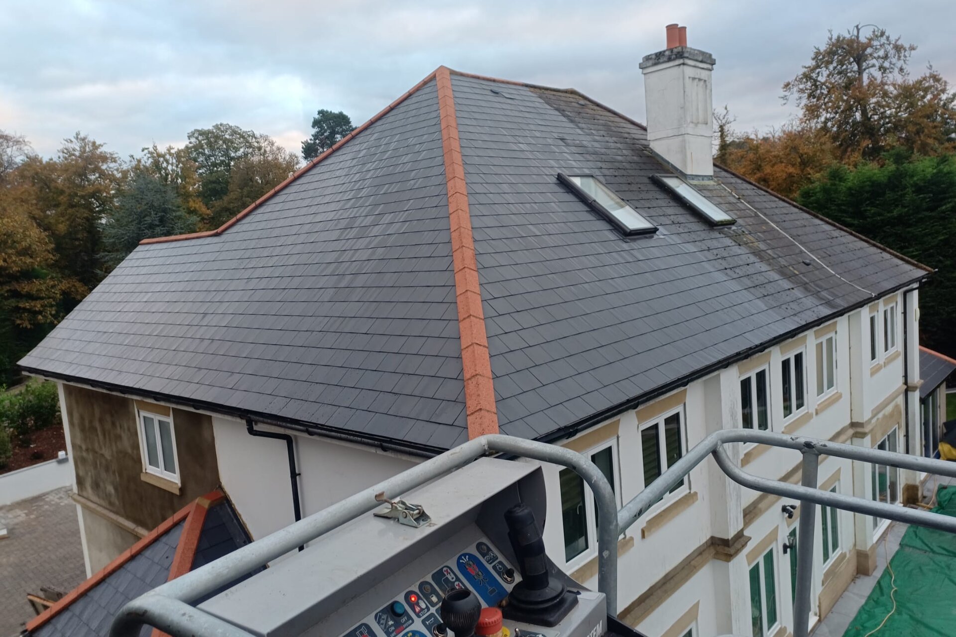 Clean house roof tiles after professional treatment